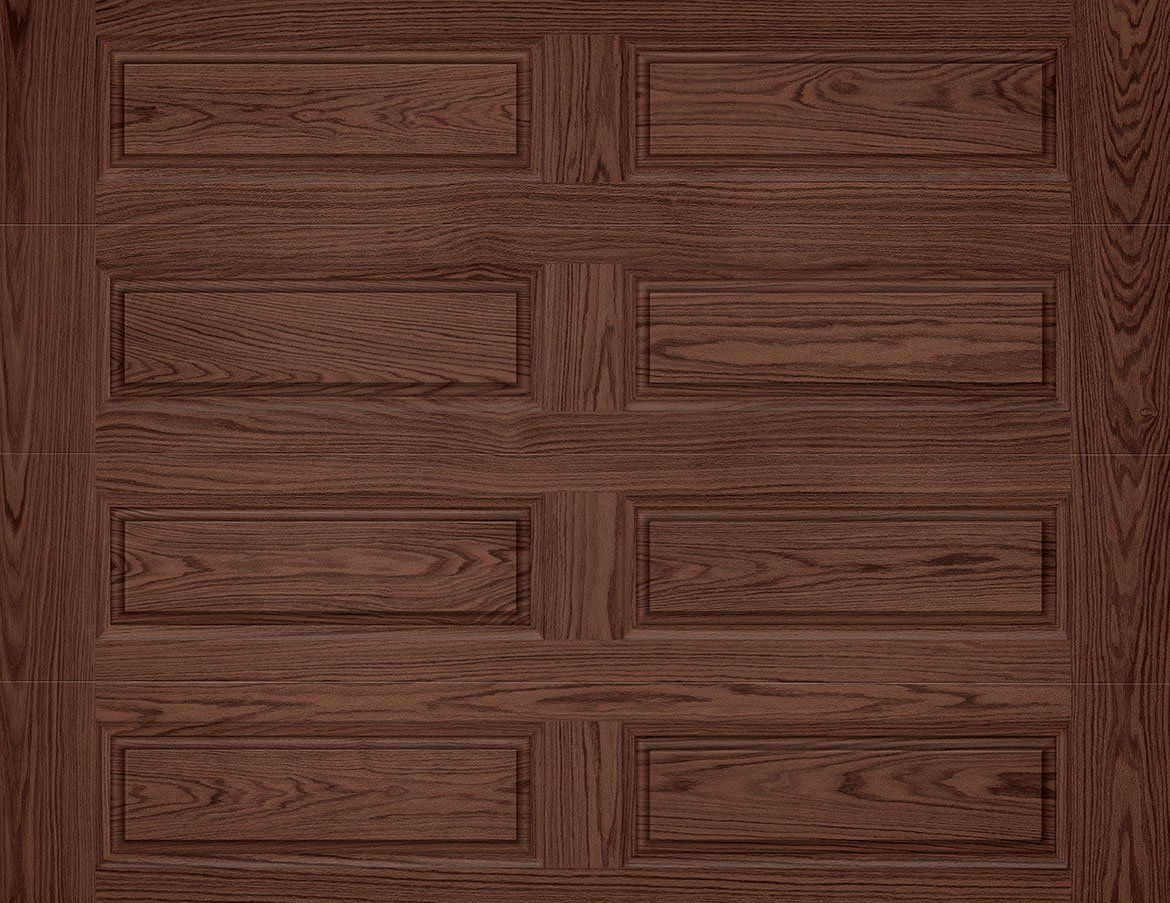 A close up of a brown wooden garage door.