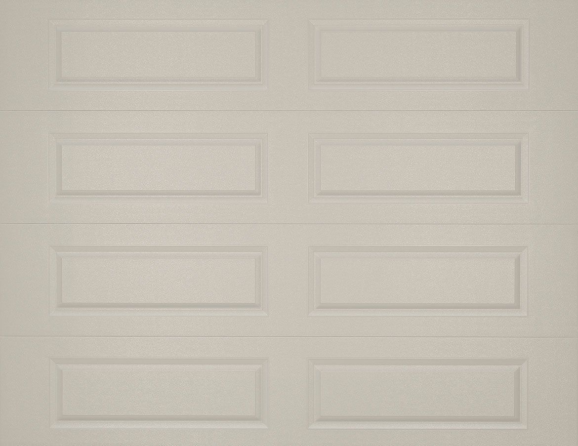 A close up of a white garage door with squares on it.