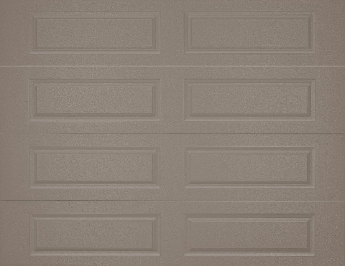 A close up of a tan garage door with square panels.