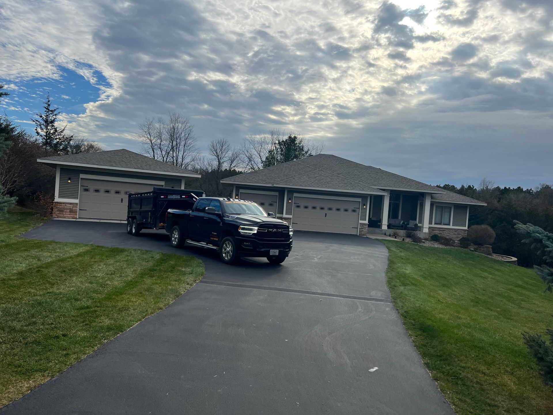 Two People Fixing Roof | New Richmond, WI | DC Roofing Inc.