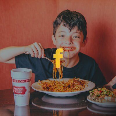 Kid Eating with Facebook Logo Hover Yellow
