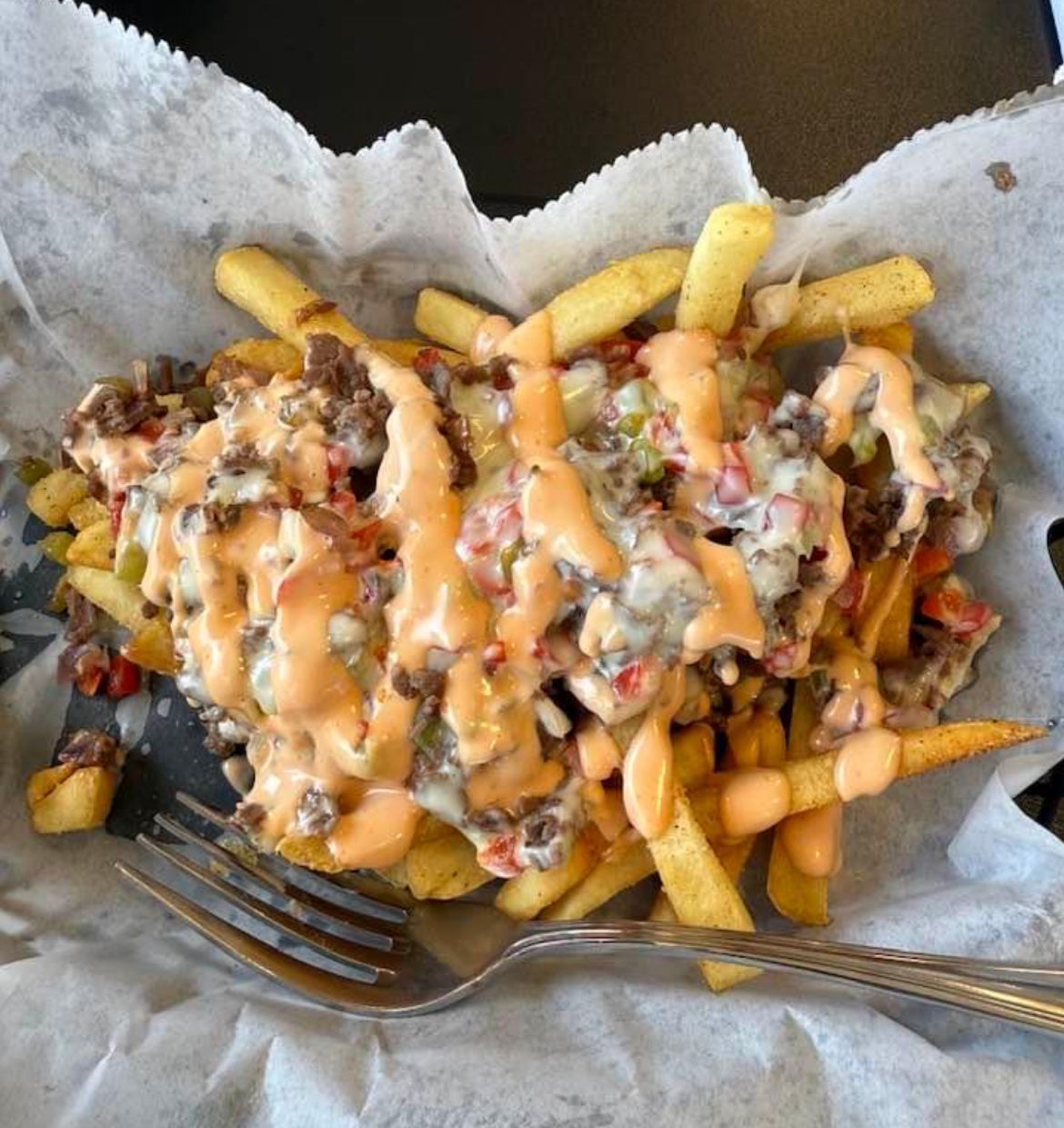 A close up of a plate of food with a fork