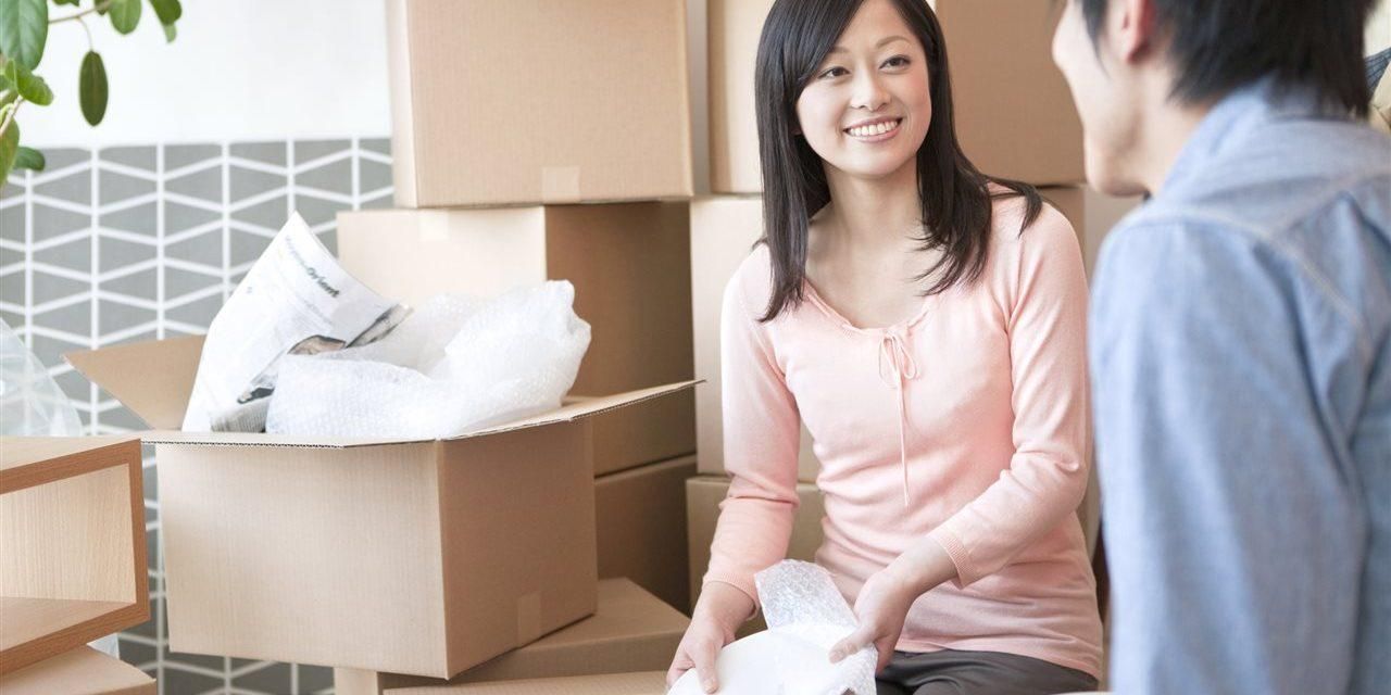 A Woman Packing Things - Coral Springs, FL - Wise Home Inspections