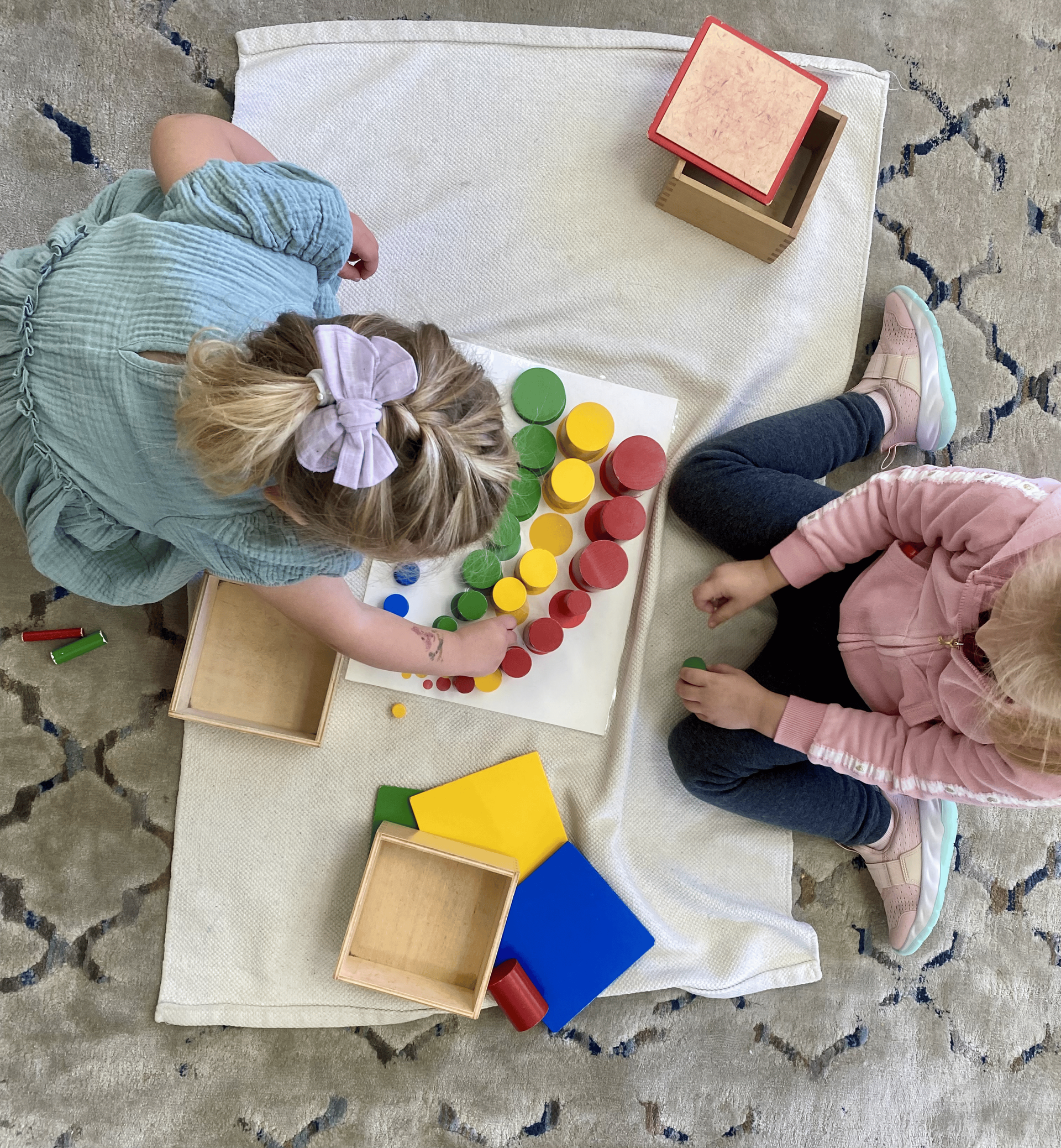 Montessori children working with color sorting