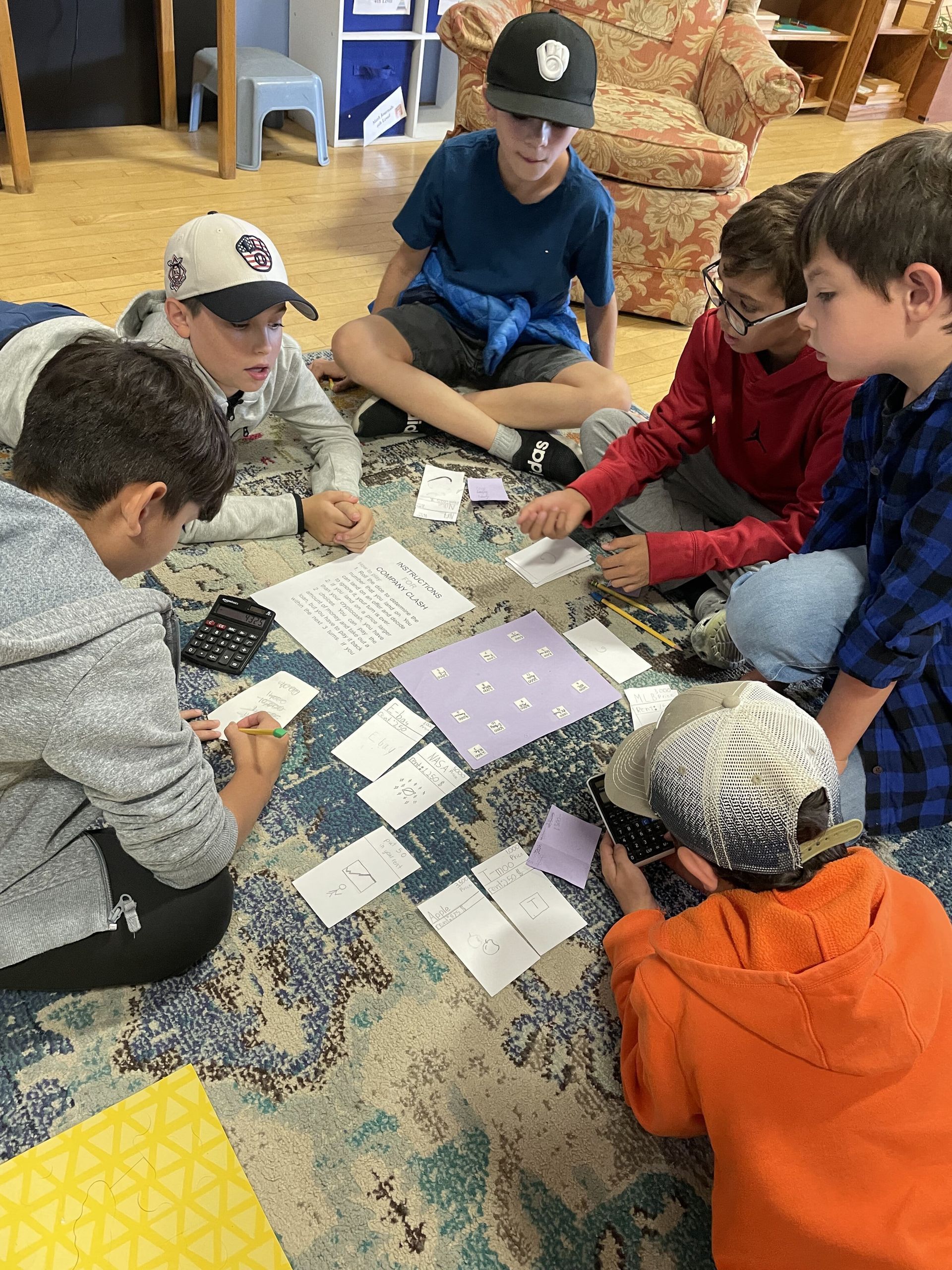 Montessori children working together in the classroom