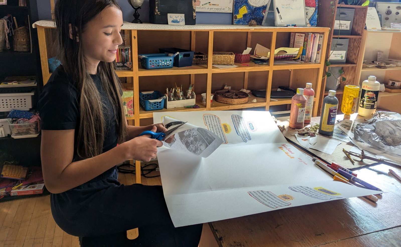 montessori adolescent working on an art project