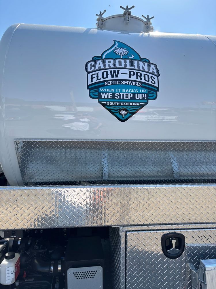 White Carolina Flow-Pros tank truck with logo and diamond plate detail.