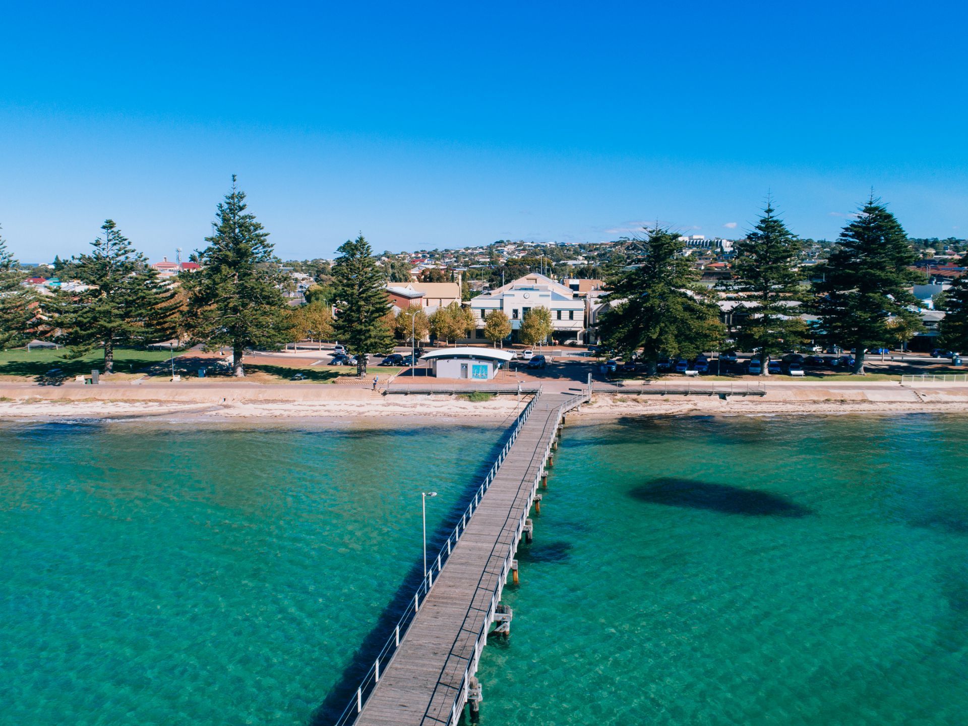 An aerial view of a pier overlooking a body of water.