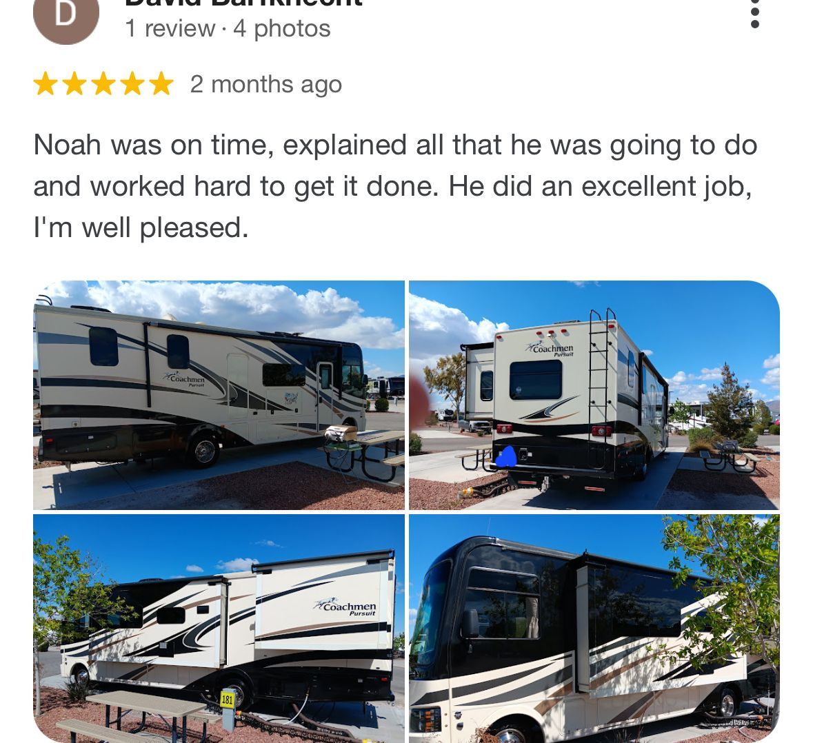 A review of a rv parked in a parking lot