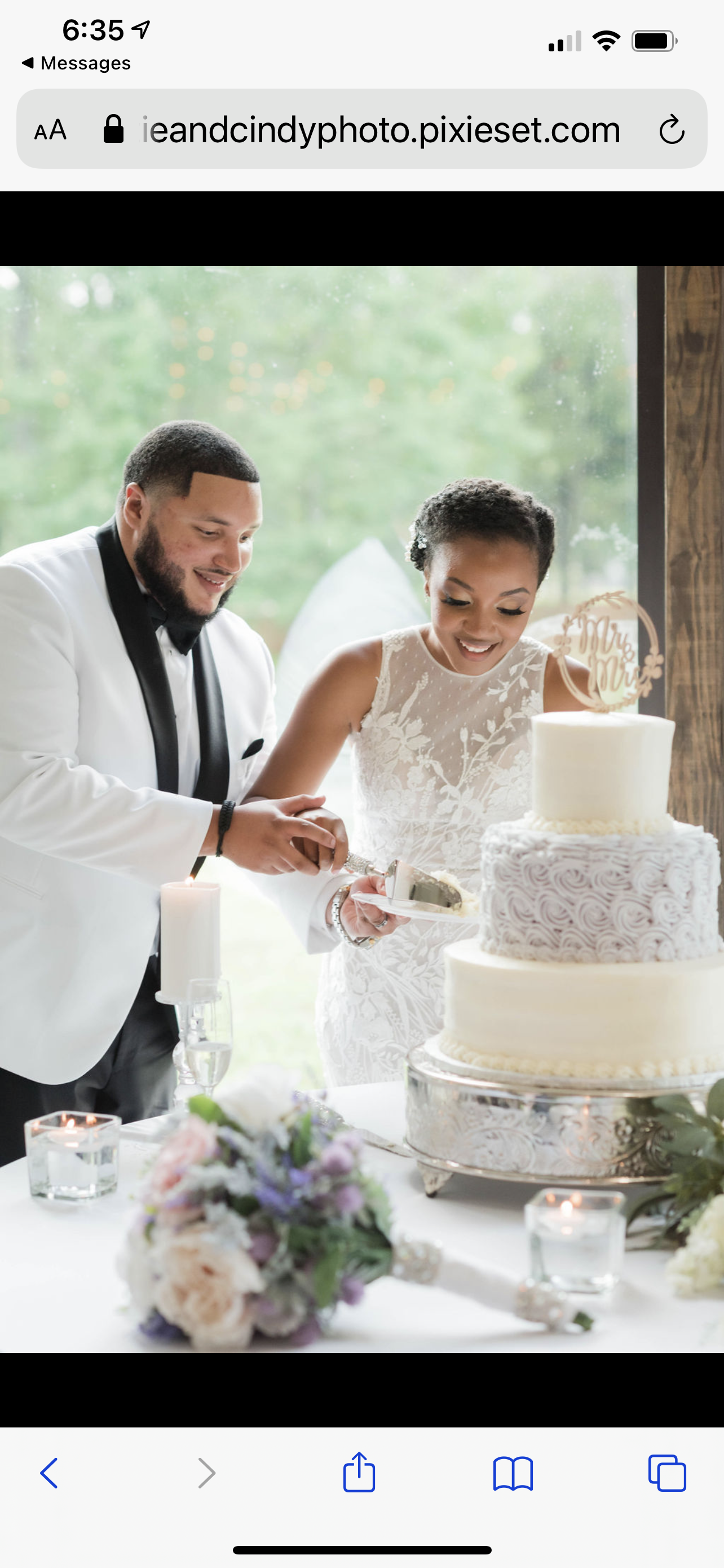 bride and groom cutting beautiful wedding cake