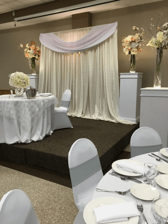 Elegant event space decorated in [color scheme] with upscale table design