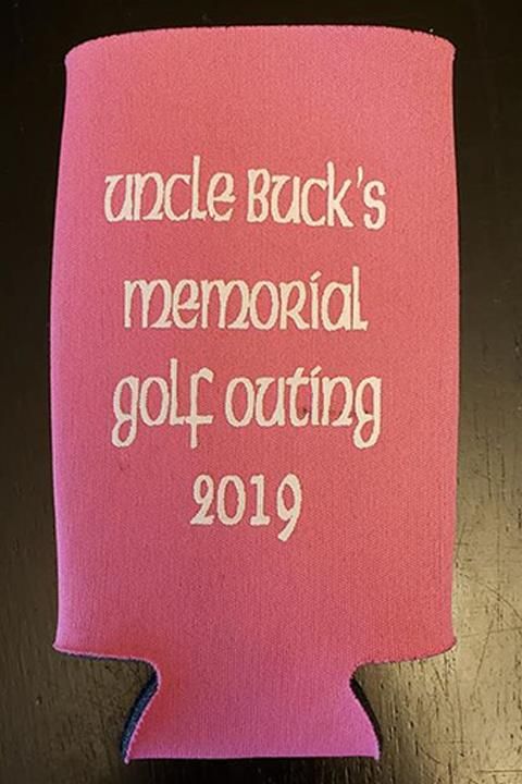Pink koozie with white text: 