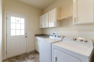 Creekside Minor Master Utility Room and Kitchen 2 — Visalia, CA — Kerman Mobile Homes Inc.