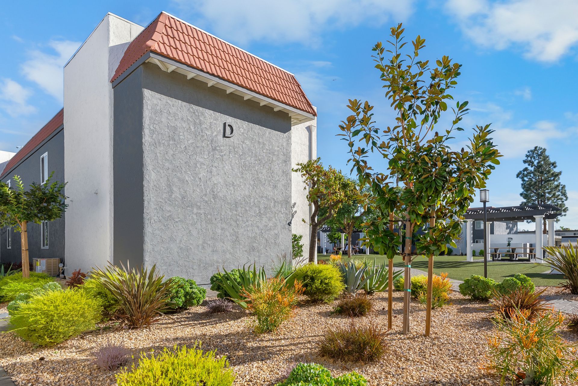 two story building with landscaping
