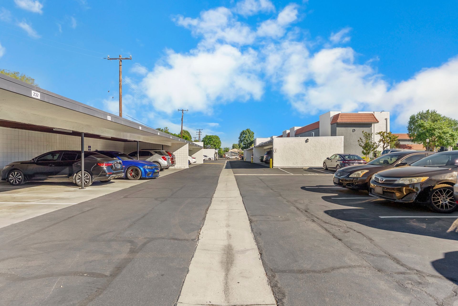 parking area with covered spaces