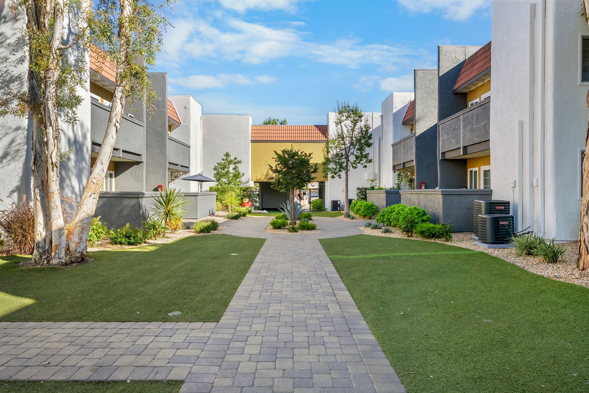 walkway through apartment buildings