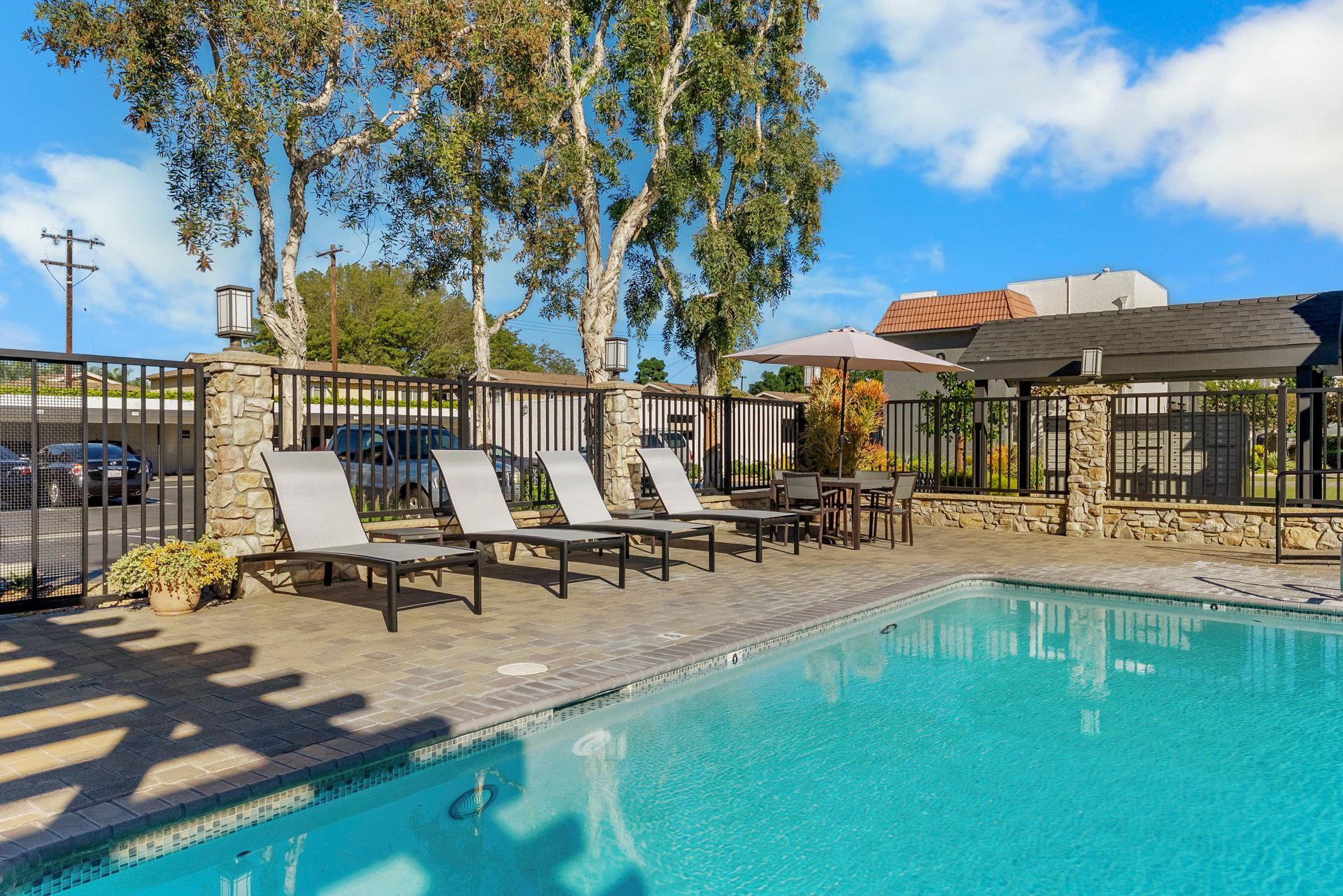 pool with lounge chairs