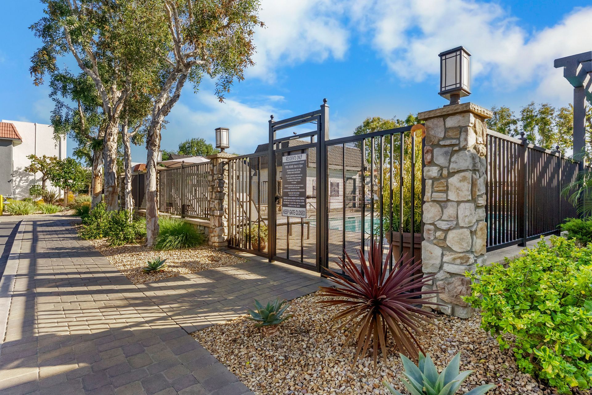 gate to enter pool and landscaping