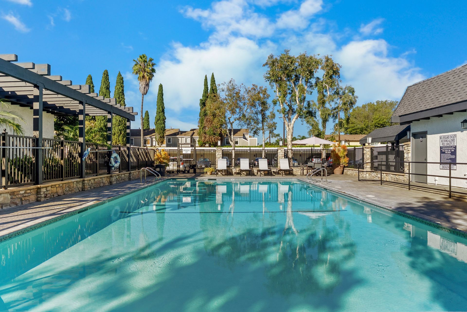 pool with lounge chairs
