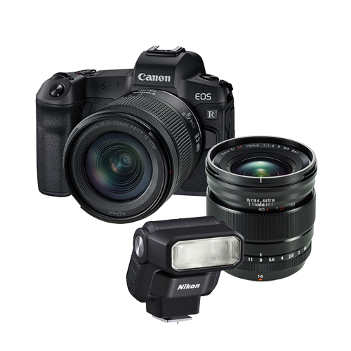 A canon camera with a lens and a flash on a white background.