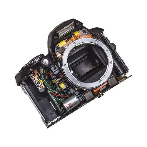 The inside of a camera is shown on a white background.