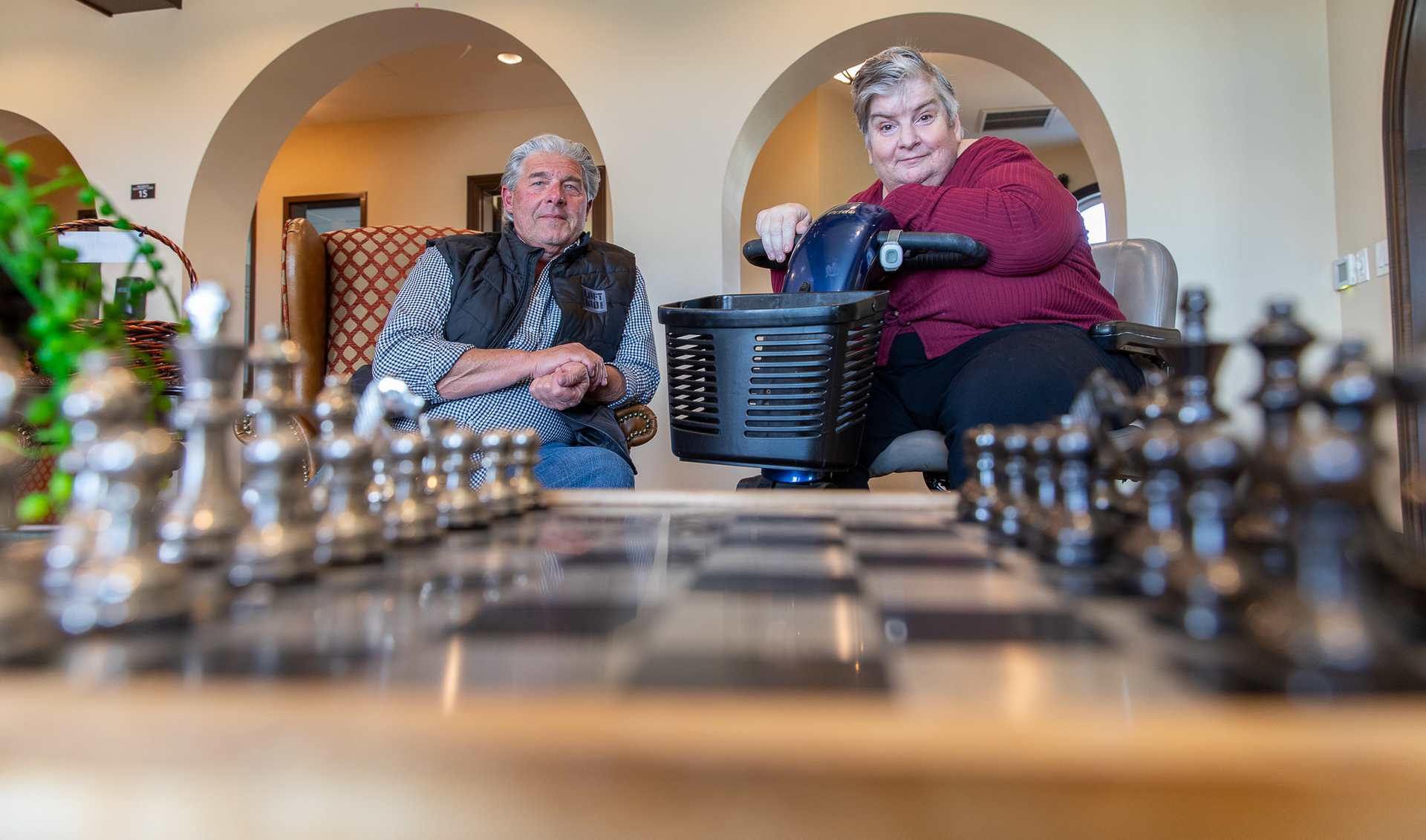 A man and a woman are playing a game of chess