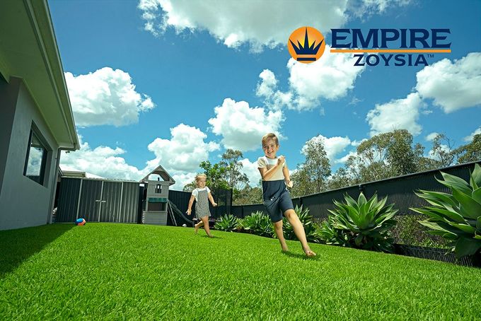 A Man Standing in the Middle of Golf Field While Sprinklers Were on | Perth, Wa | Westland Turf