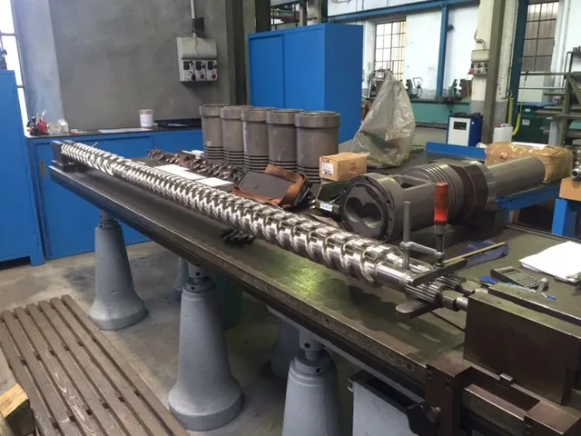 Industrial Screw And Barrel being repaired