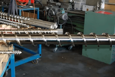 Industrial Screw And Barrel being repaired