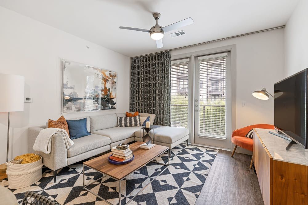 Spacious and Modern Living Room at The Nash Apartment Homes in Dallas, TX