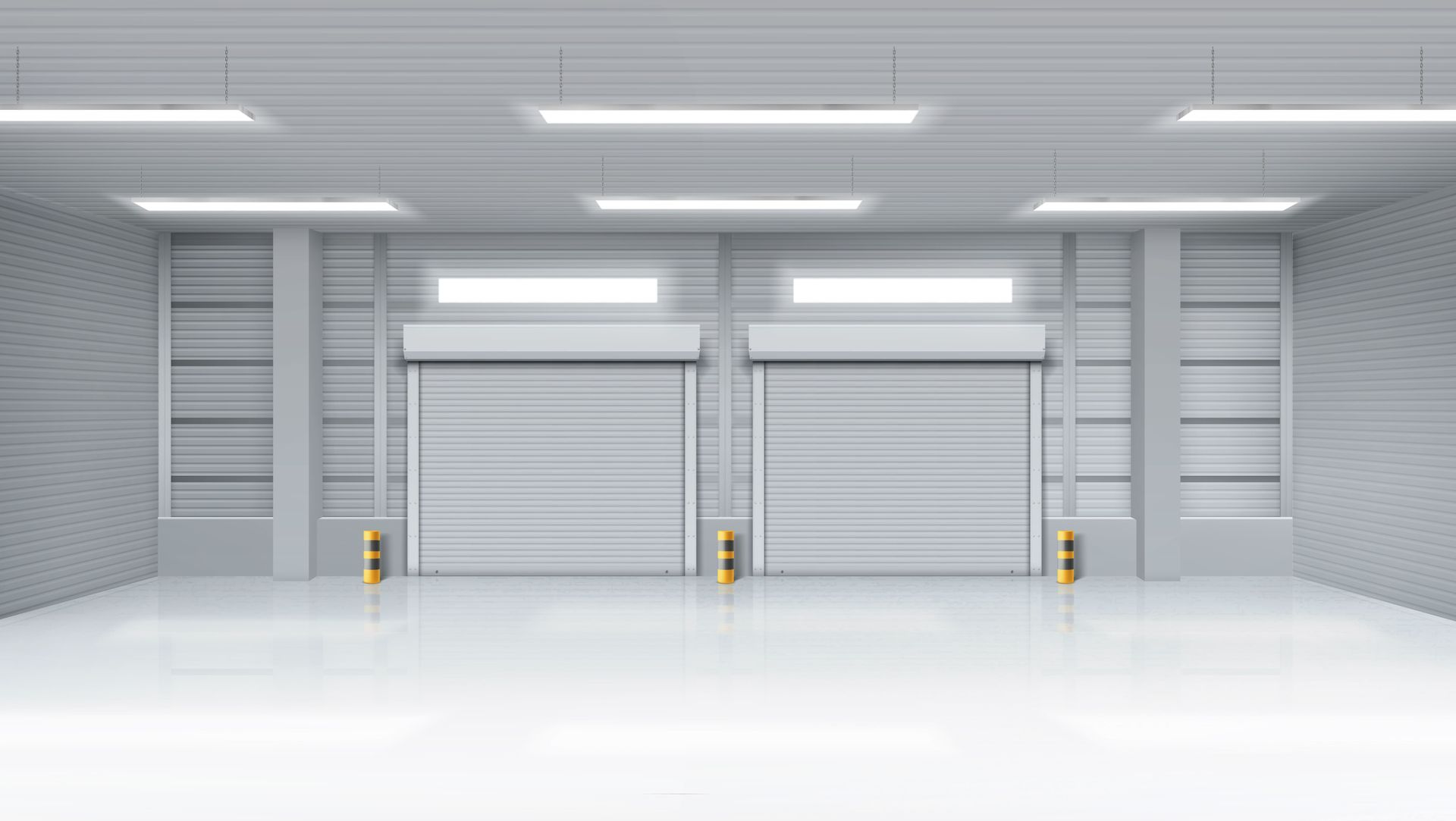 Gray garage doors on a modern white house with a gray paved driveway.