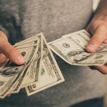 Holding Money — Columbus, OH — AA Cash 4 Junk Cars