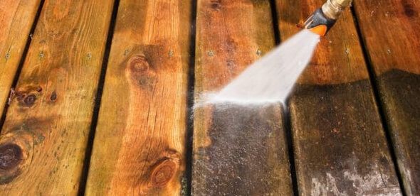 Deck power washing cleaning wood surface before staining or sealing in New Jersey