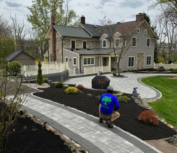 Landscaping installation services in Hackettstown NJ for new construction homes, overgrown older properties, and partial yard upgrades including garden beds and patio plantings
