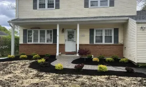 Garden bed maintenance with pruning, weeding, and edging services