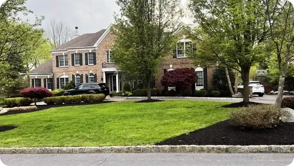 Homeowner discussing landscaping budget and design cost estimate with professional