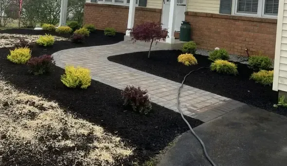 Mulch refresh and bed cleanup services in Hackettstown NJ improving soil health, suppressing weeds, and maintaining clean edges