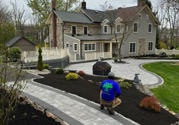 Ongoing landscape maintenance including bed weeding, shrub pruning, edge trimming, and routine property care in Hackettstown NJ
