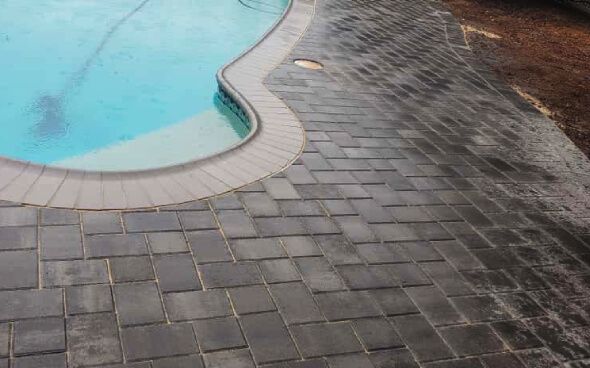 Patio design options in New Jersey including concrete pavers, natural stone, bluestone, and travertine for custom outdoor spaces