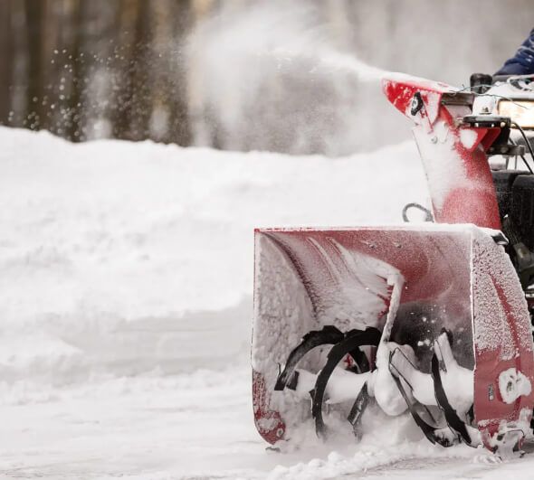 Residential snow plowing service clearing long and circular driveways in Hackettstown NJ