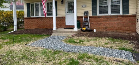 Custom walkway design options including natural stone, pavers, and concrete paths tailored to home style and budget
