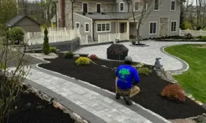Stone walkway landscaping with pavers and natural path design for home