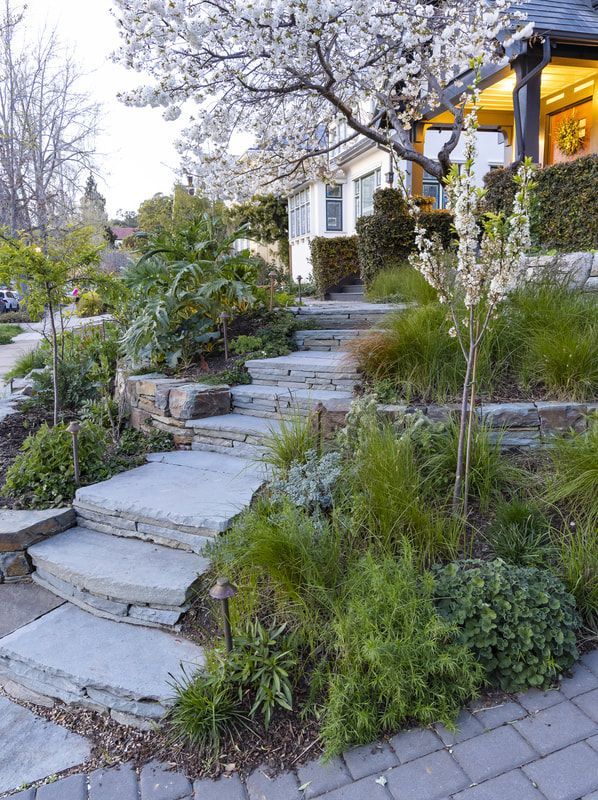 A set of stone steps leading up to a house