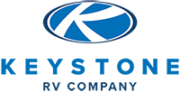 Logo for Keystone RV Company: blue oval with a stylized