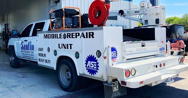 White mobile repair truck with