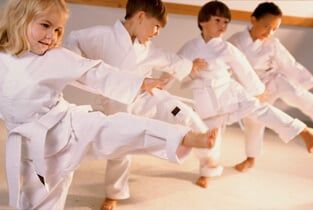 Group of children learning karate - Extracurricular Activities in North Springfiel, VA