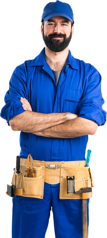 Mechanic wearing blue overalls, cap, and tool belt, arms crossed, smiling.