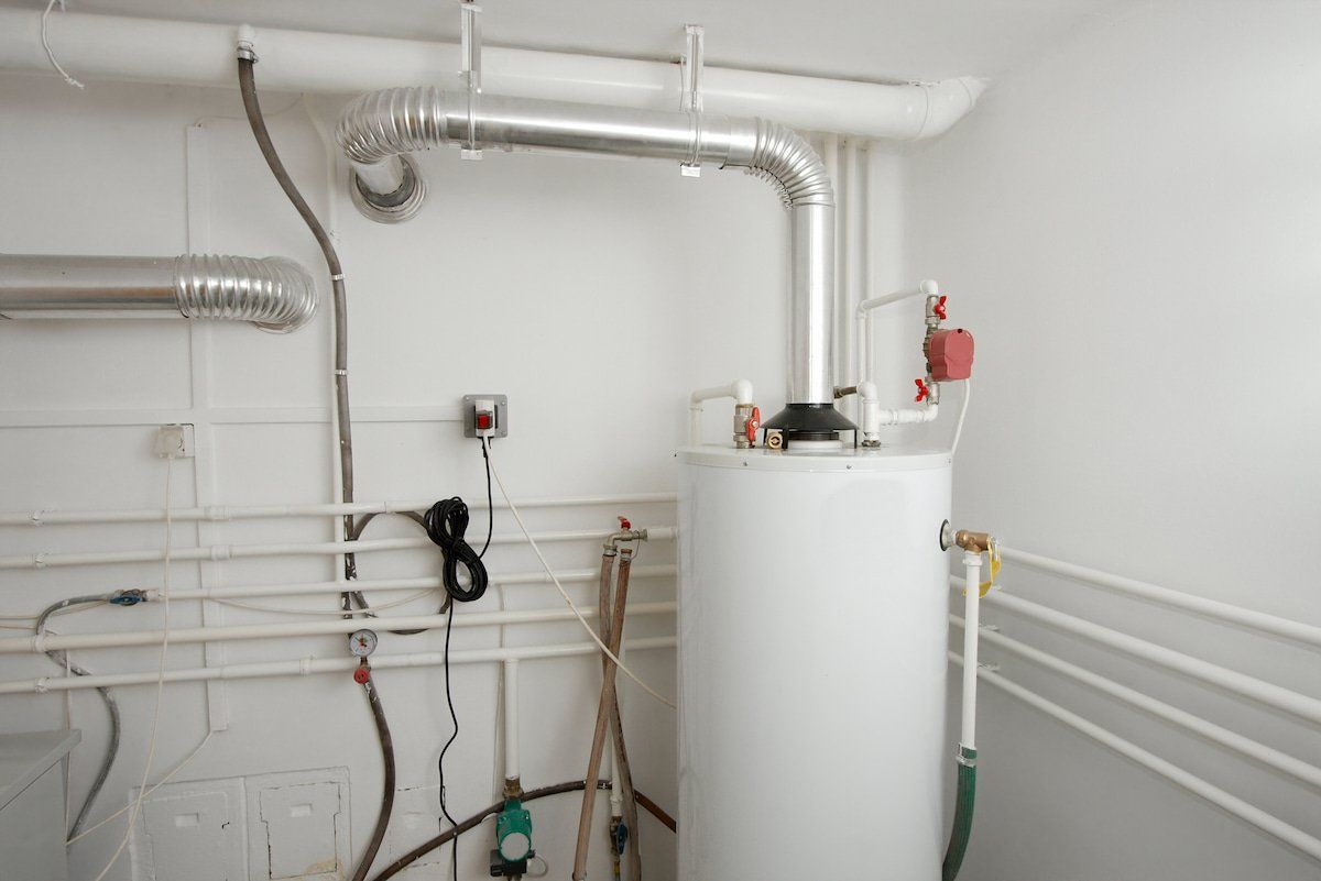 Installing Water Heater — Plumbing in Townsville, QLD