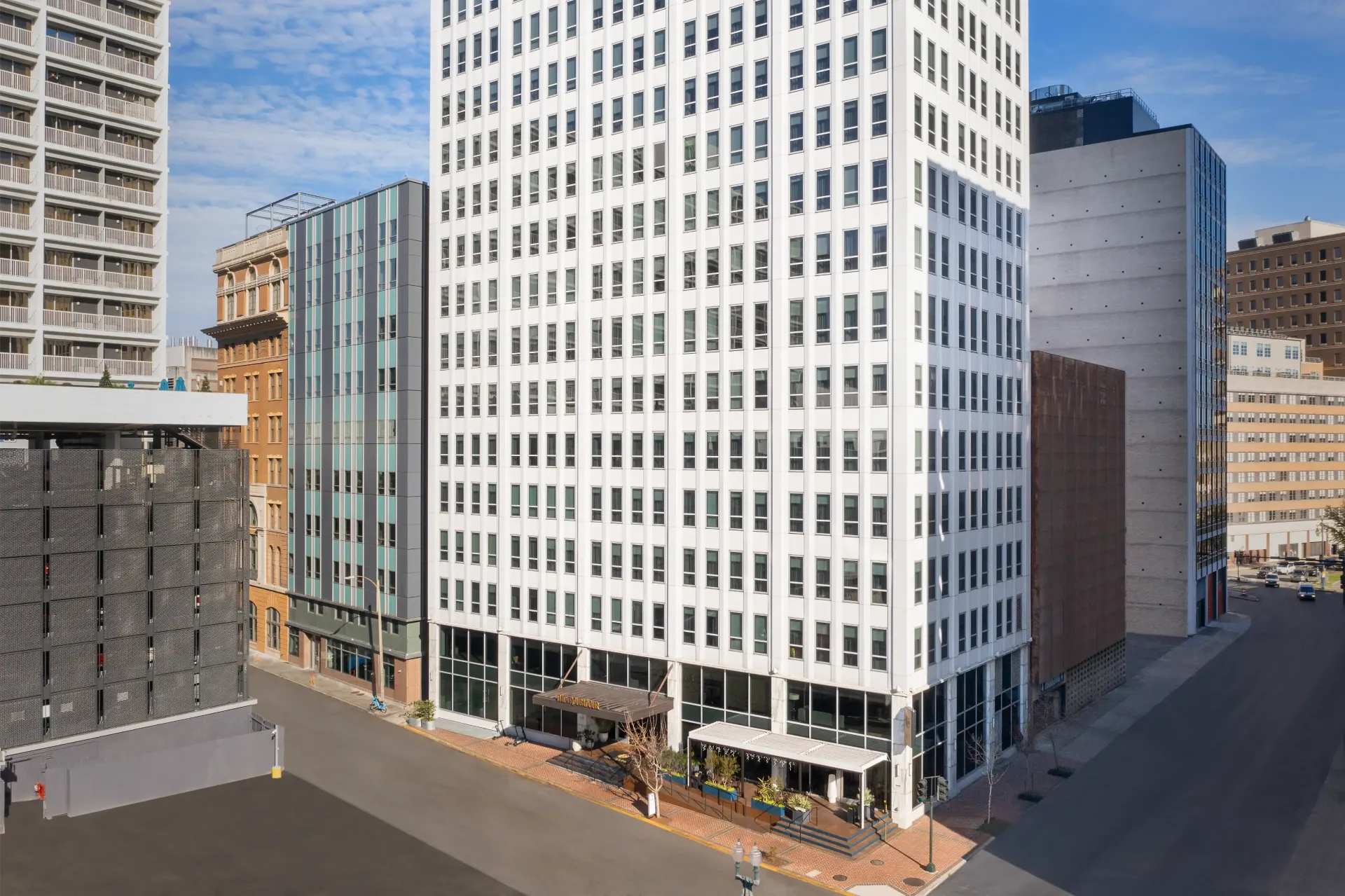 An aerial view of a tall building in a city