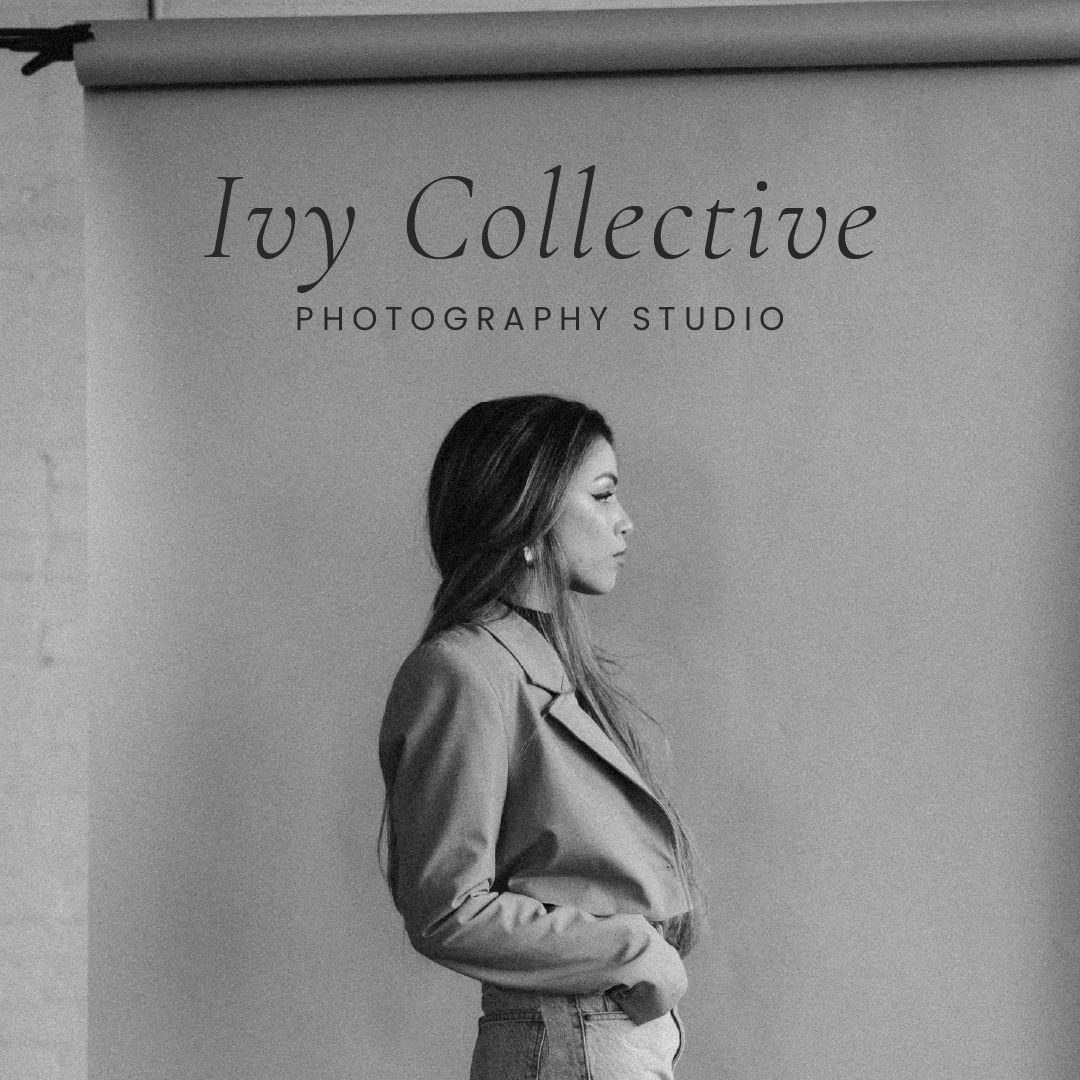 A woman is standing in front of a sign that says ivy collective photography studio